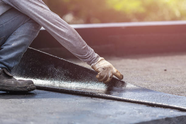 Professional Emergency Waterproofing technician working in Brownsville, PA